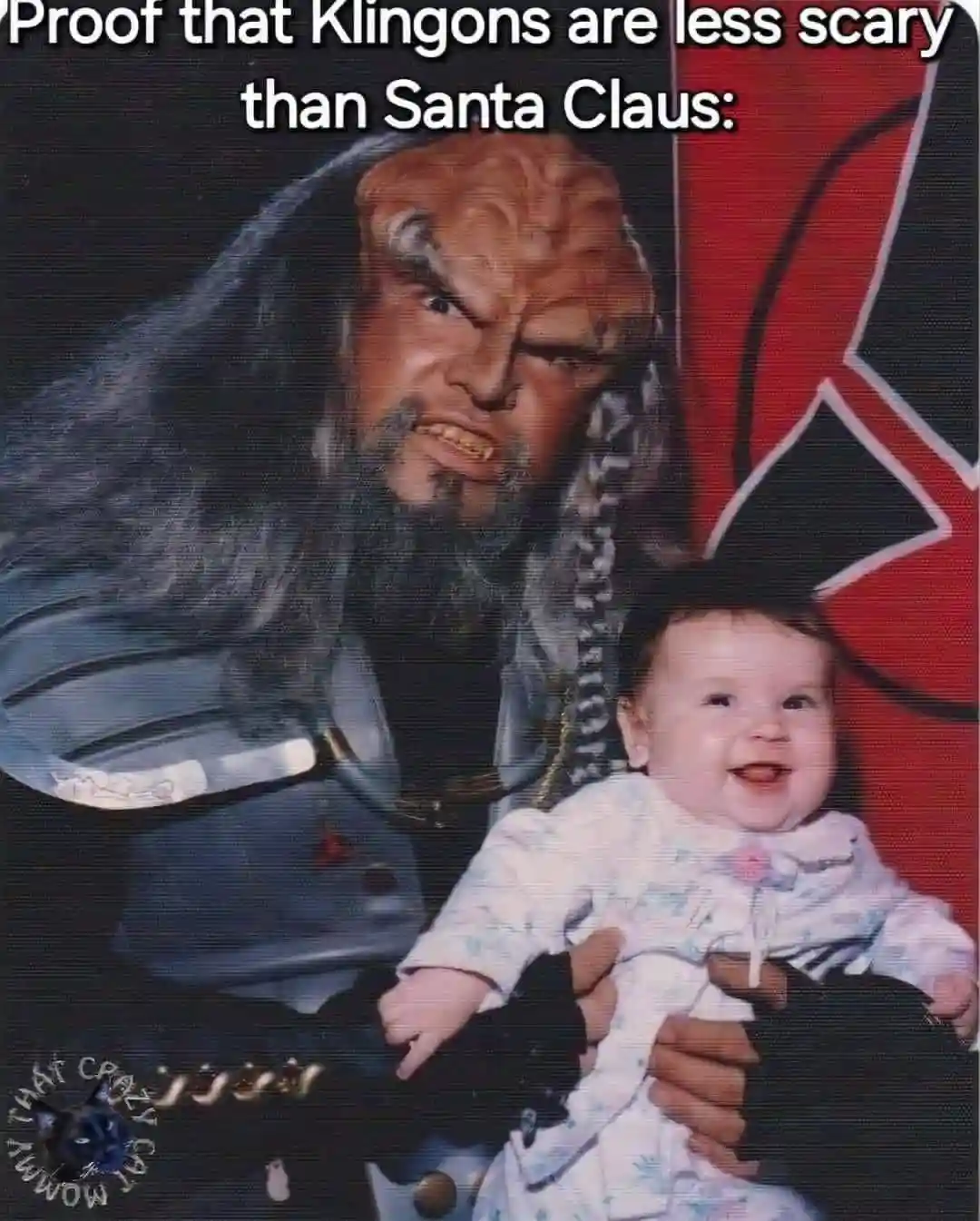 A photo shows a person in a menacing Klingon costume holding a smiling baby. The text overlaid at the top reads 'Proof that…