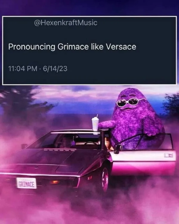 A purple, fuzzy cartoon character wearing sunglasses sits in the driver's seat of a purple sports car, holding a milkshake…
