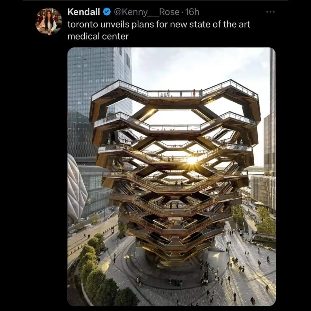 The image shows a large, complex, multi-level architectural structure resembling a honeycomb or stacked hexagonal walkways…