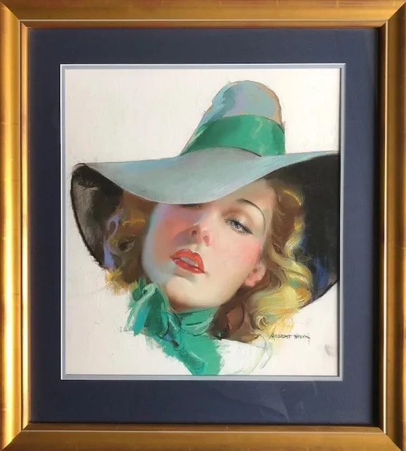 A framed painting of a woman with blonde hair wearing a large, light blue hat with a green ribbon, her face partially…