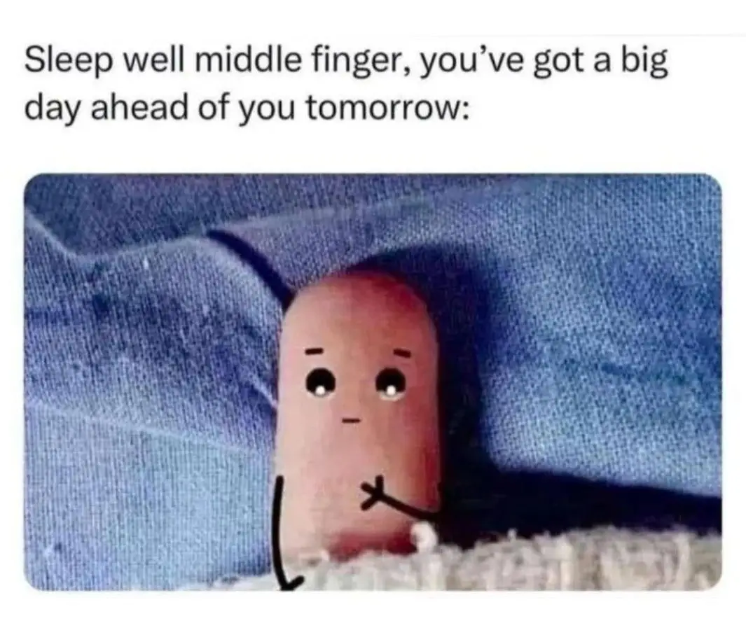 A cartoonish middle finger with simple black eyes and a straight mouth is shown lying down on a textured white surface…