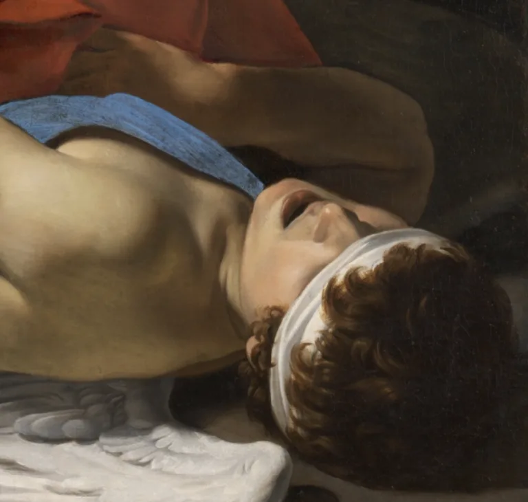 A classical painting depicts a young, winged figure lying on their back with eyes closed and mouth slightly open, appearing…