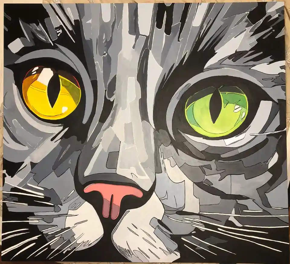 A stylized painting of a cat's face with one eye painted yellow and the other green, both with vertical pupils, set against…