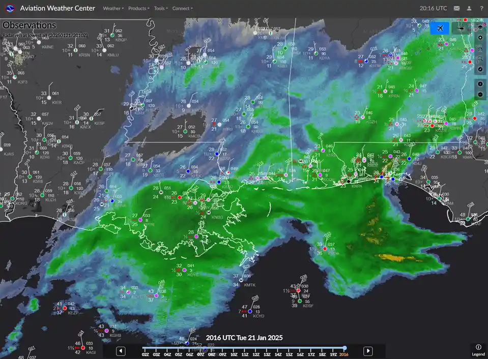 A weather radar map from the Aviation Weather Center displays a large, intense green storm system over the southeastern…