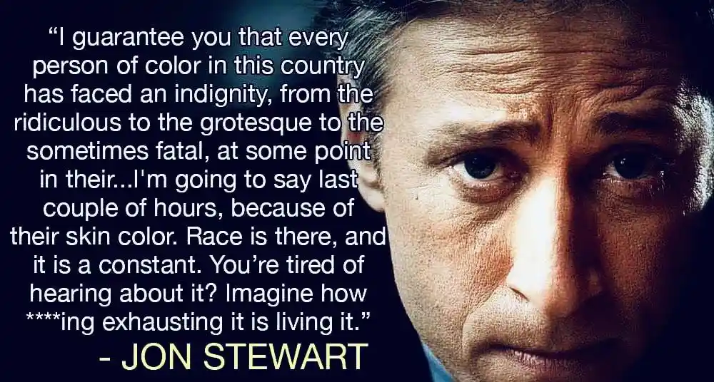 A close-up image of Jon Stewart with a serious, intense expression, overlaid with a long quote attributed to him about the…