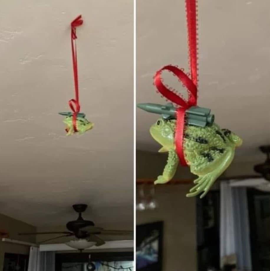 The image is a split-screen showing a small green plastic frog ornament hanging from a red ribbon tied to a ceiling. The…