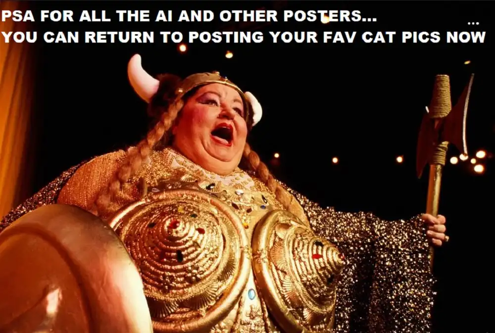 A woman in a gold Viking costume with horns, holding an axe and shield, is shown with a wide-open mouth as if shouting. The…
