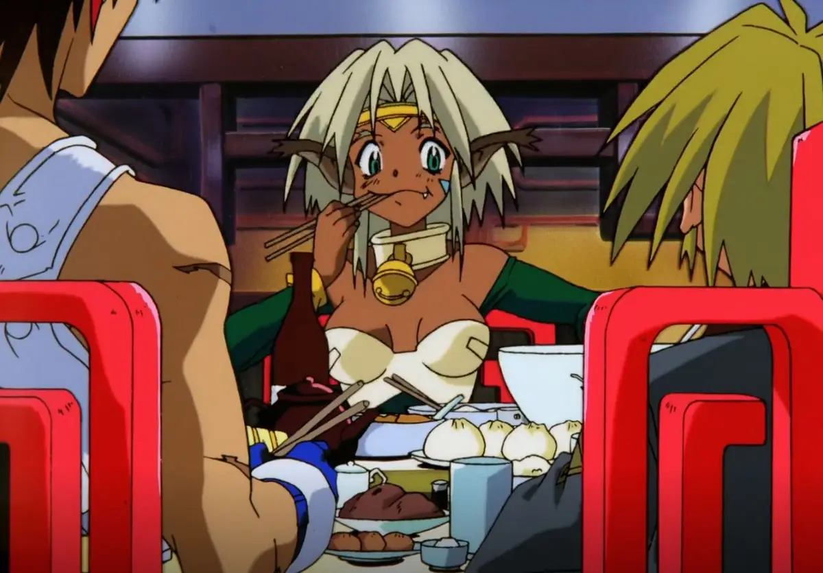 An anime scene shows a female elf-like character with white hair and green eyes sitting at a restaurant table, holding…