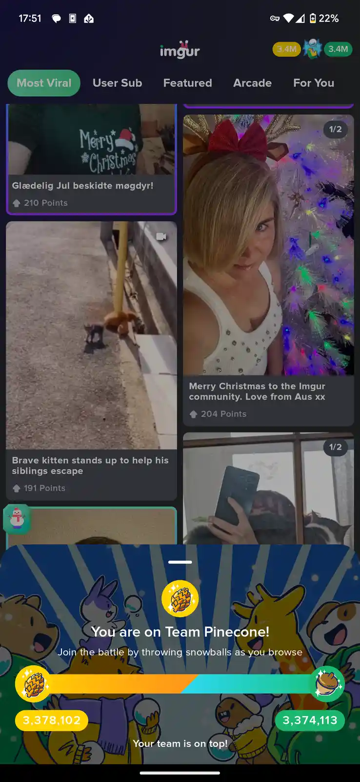 An Imgur mobile app screenshot showing a Christmas-themed 'Team Pinecone' battle overlay at the bottom, with cartoon animals…