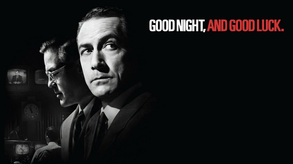 A black-and-white promotional image for the 2005 film 'Good Night, and Good Luck,' featuring two men in suits looking…