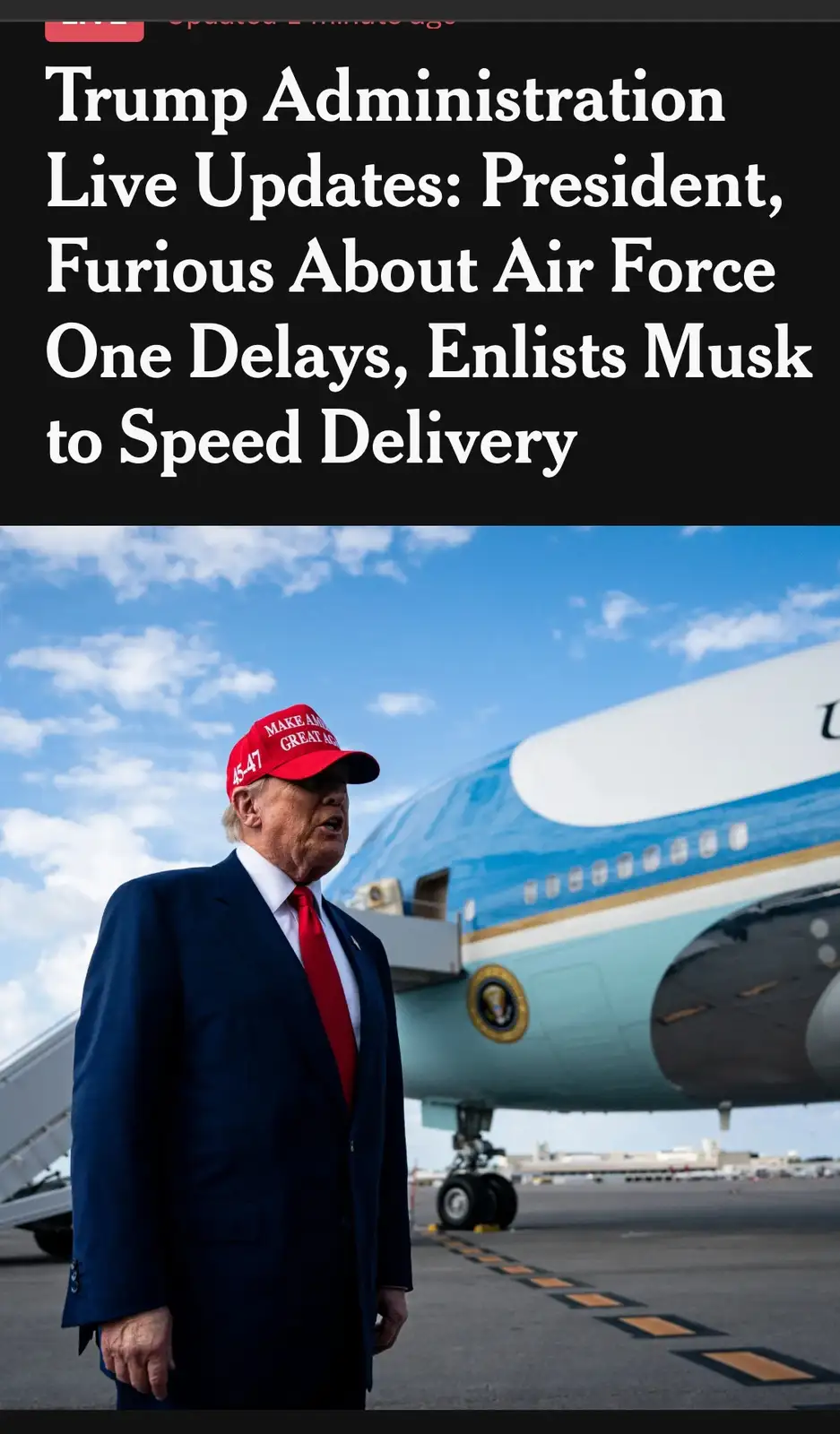 A man in a blue suit, red tie, and red 'Make America Great Again' cap stands on an airport tarmac in front of Air Force One…