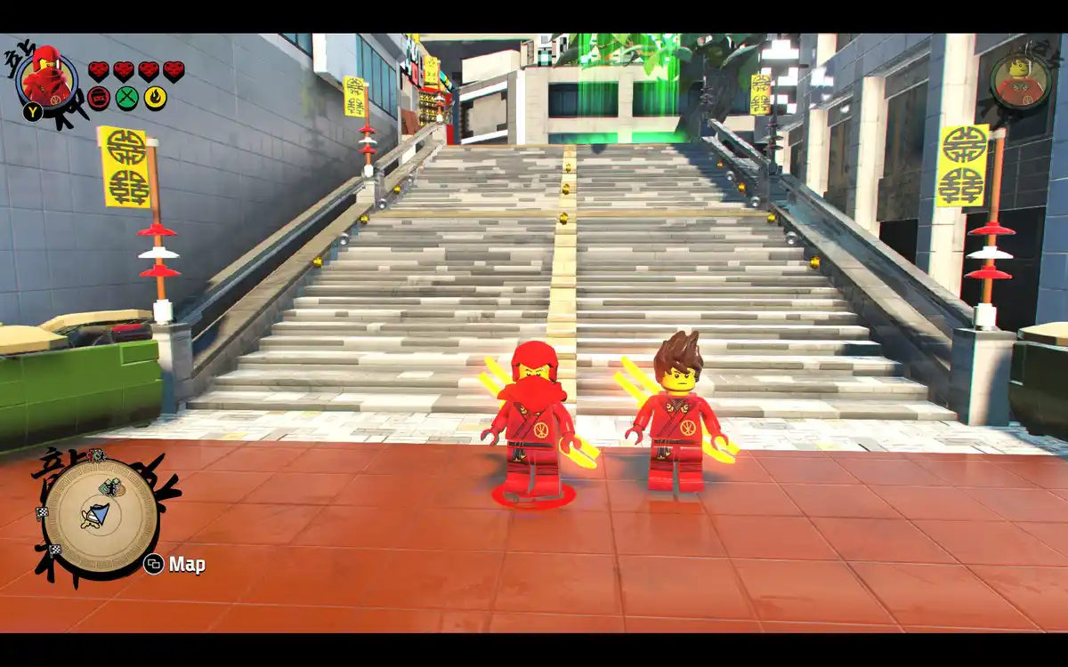 Two LEGO Ninjago characters in red ninja outfits stand at the bottom of a long, wide staircase in an urban setting with…