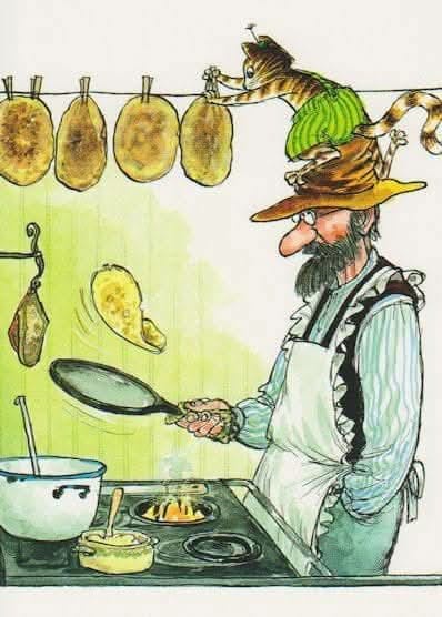 A cartoon man with a beard and hat, wearing an apron, is cooking in a kitchen. He holds a frying pan, and above him, a cat…