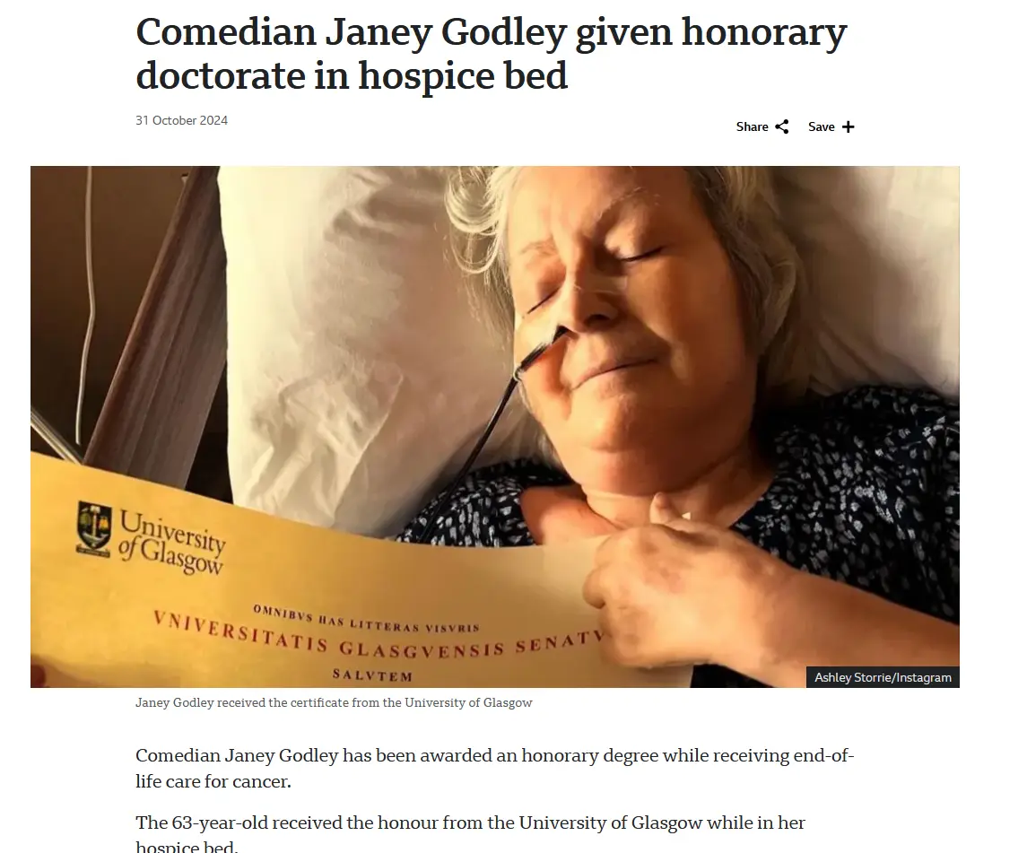 An elderly woman with closed eyes lies in a hospital bed, holding a yellow University of Glasgow honorary doctorate…