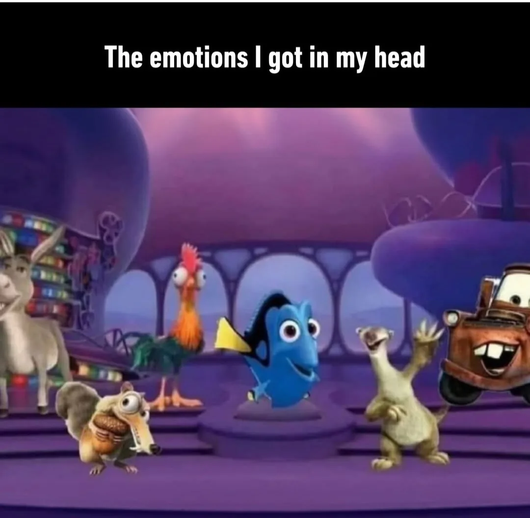 A still from a Disney/Pixar animated movie featuring several characters including Dory, a blue fish, standing center stage…