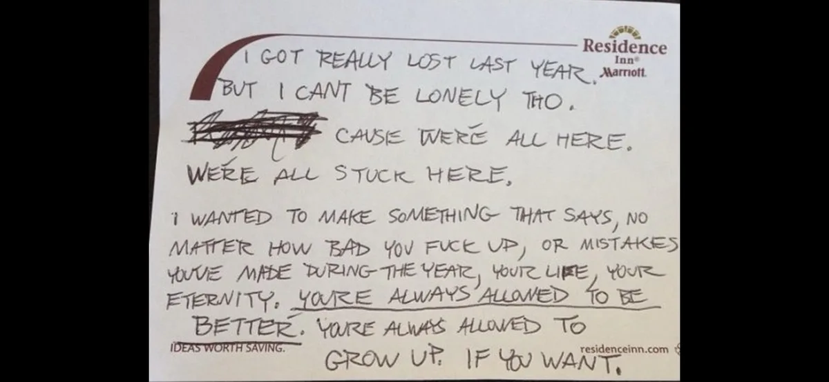 A handwritten note on a Residence Inn Marriott notepad, with the top line crossed out and replaced with 'WERE ALL STUCK…
