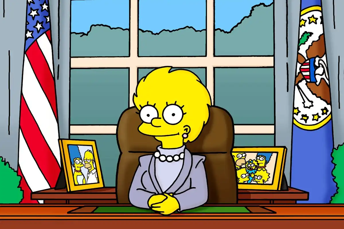 Lisa Simpson sits in the Oval Office, flanked by an American flag and a presidential seal, with a smug expression. On the…