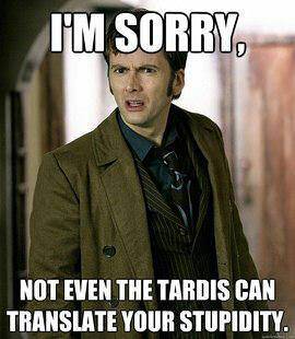 A man in a brown coat and dark shirt stands in a hallway with a look of exaggerated regret or apology. The overlaid text…