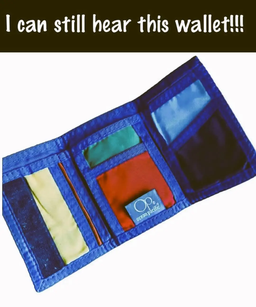 A blue Ocean Pacific brand wallet is open, revealing colorful inner compartments including red, green, and yellow sections…