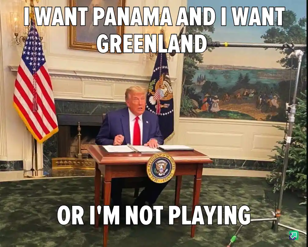 A man in a blue suit and red tie sits at a wooden desk with the presidential seal, flanked by American and presidential…