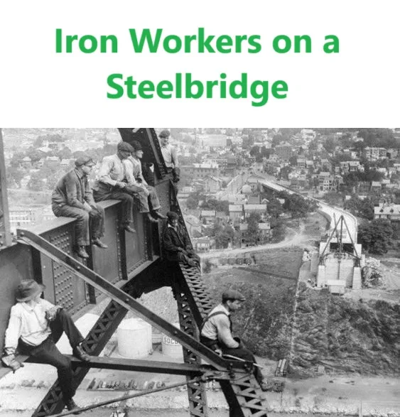 A black-and-white historical photo shows several iron workers casually sitting and lounging on the steel girders of an…