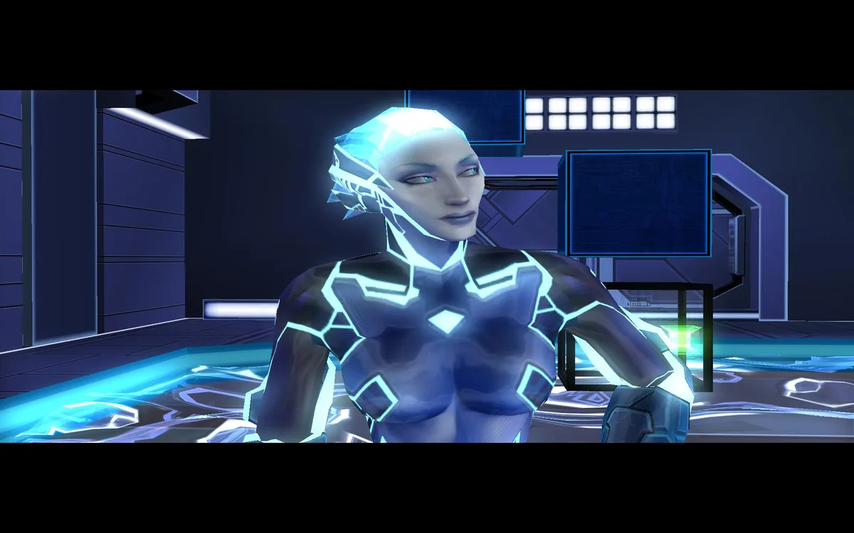 A female video game character with glowing blue circuit-like patterns on her skin and hair stands in a futuristic, dark blue…