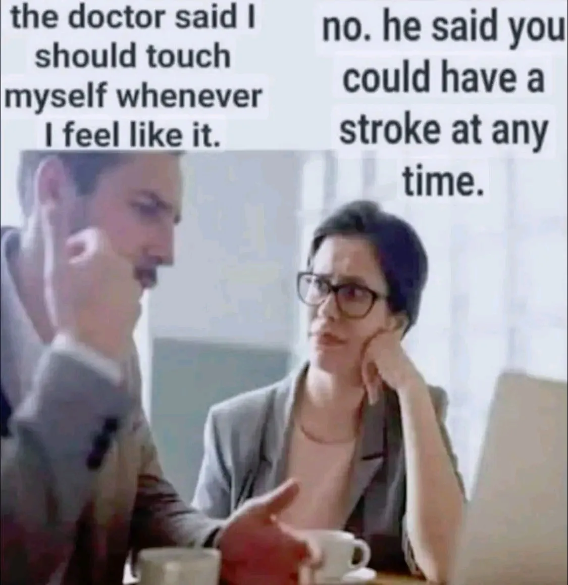 A man in a suit gestures while speaking to a woman in glasses who rests her chin on her hand, looking skeptical. The text…