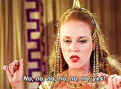 A six-panel meme collage from the 1954 film 'Cleopatra' featuring actress Elizabeth Taylor as Cleopatra. In each panel, she…