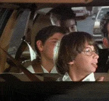 A six-panel image sequence from the movie 'The Breakfast Club' showing a young woman with glasses in a car, initially…