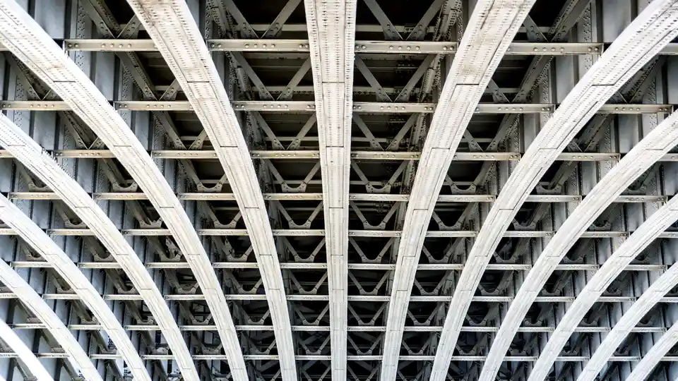 In central London, a 19th-century iron bridge crosses the River Thames, rebuilt after the original 18th-century Blackfriars…