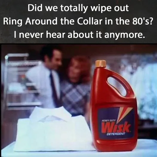 A vintage advertisement image shows a red jug of Wisk Heavy Duty Detergent sitting on a table next to a folded white shirt…