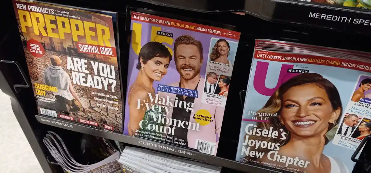 Three magazines sit side-by-side on a store shelf: a 'Prepper Survival Guide' asking 'Are you ready?', and two identical 'Us…