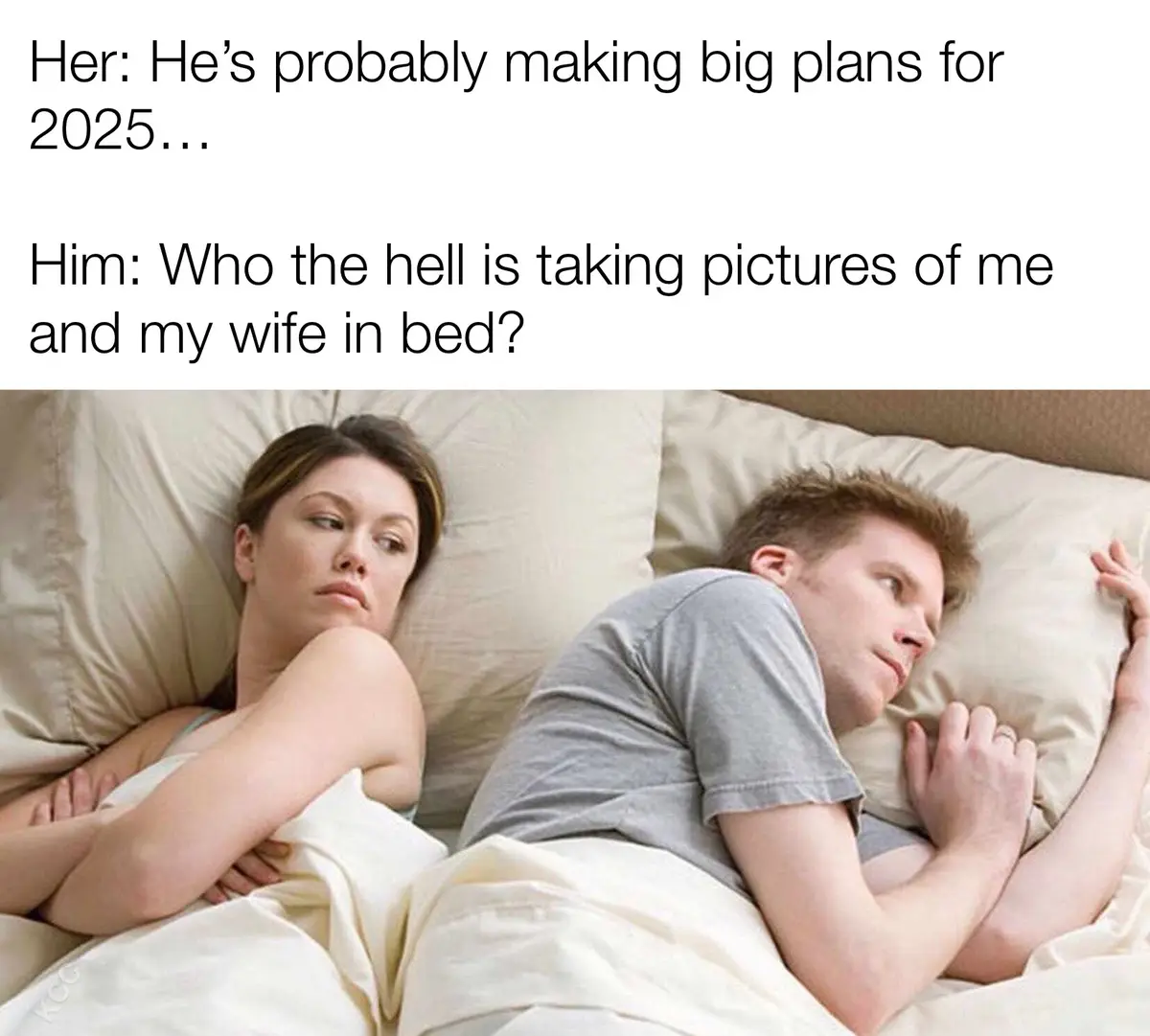 A man and woman lie in bed, turned away from each other, appearing to be in a disagreement. The woman looks annoyed, while…