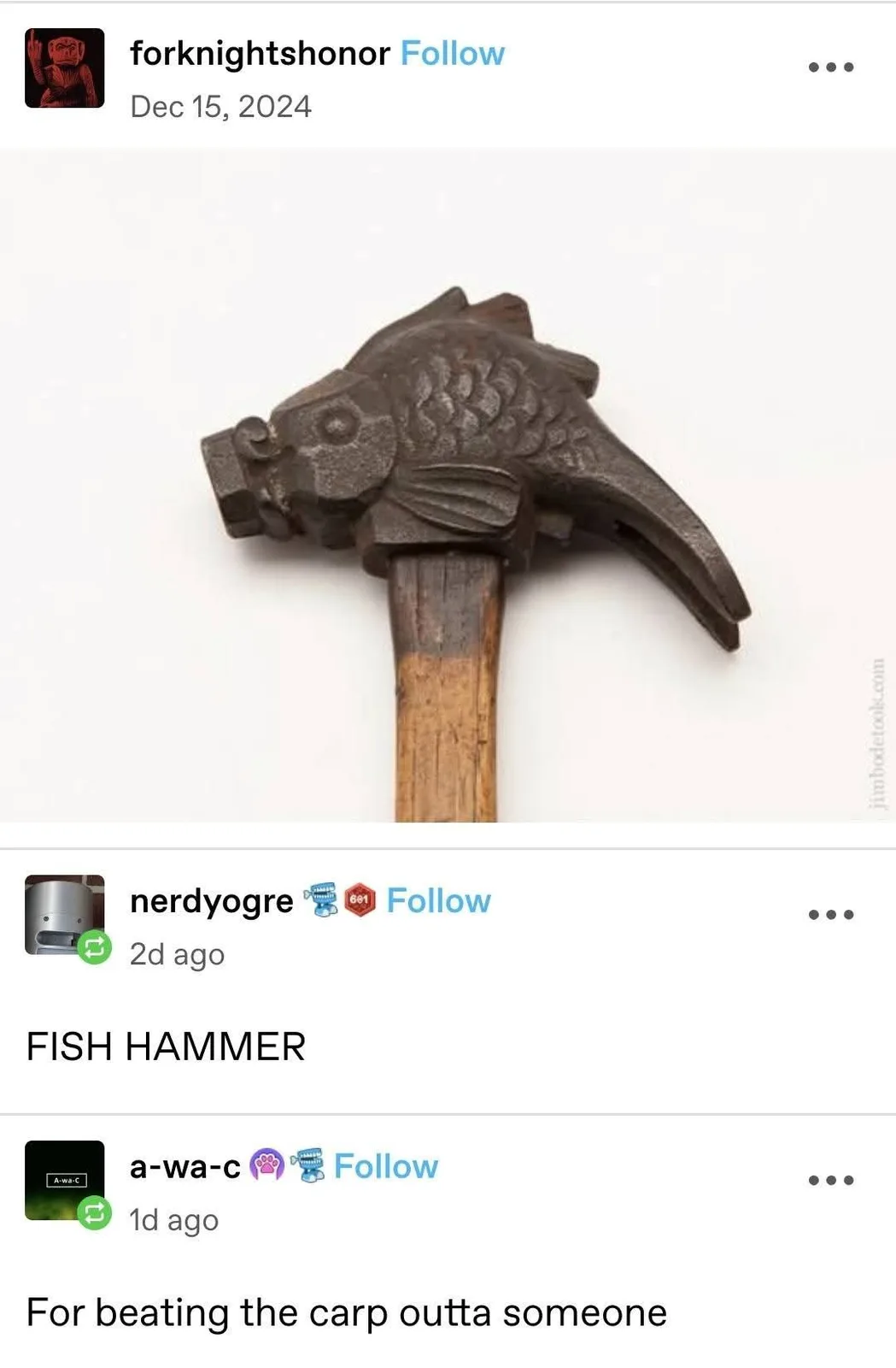 A close-up photo shows a hammer with a head shaped like a fish, complete with scales, fins, and an eye, mounted on a wooden…