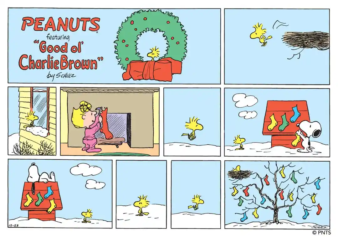 A Peanuts comic strip titled 'Good Ol' Charlie Brown' by Schulz, showing Snoopy and Woodstock decorating for Christmas…