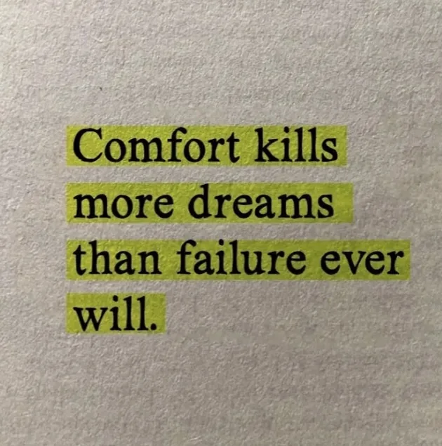 The image displays the text 'Comfort kills more dreams than failure ever will.' in black font, each word or phrase on a…