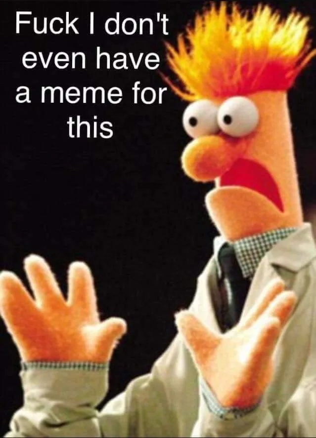 The image shows the Muppet character Bert with a shocked expression, wide eyes, and hands raised in surrender. He wears a…