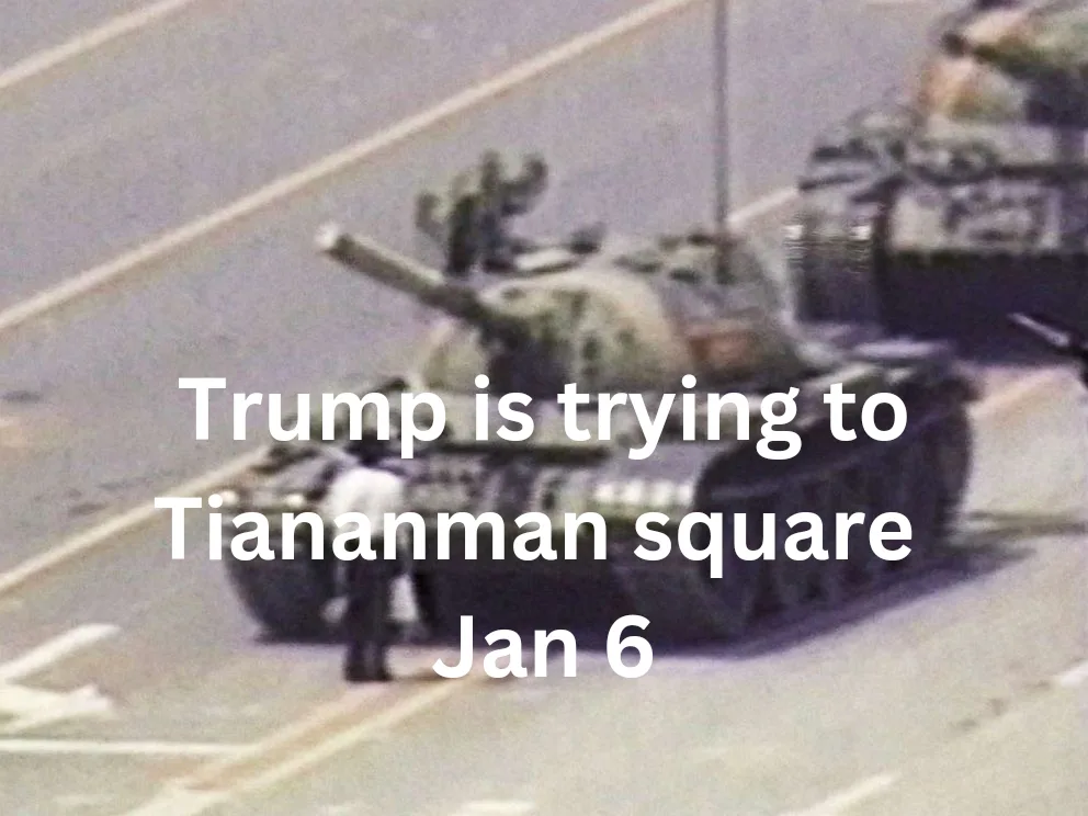 A blurry, low-resolution image shows a military tank on a paved road with a person standing in front of it. Overlaid white…