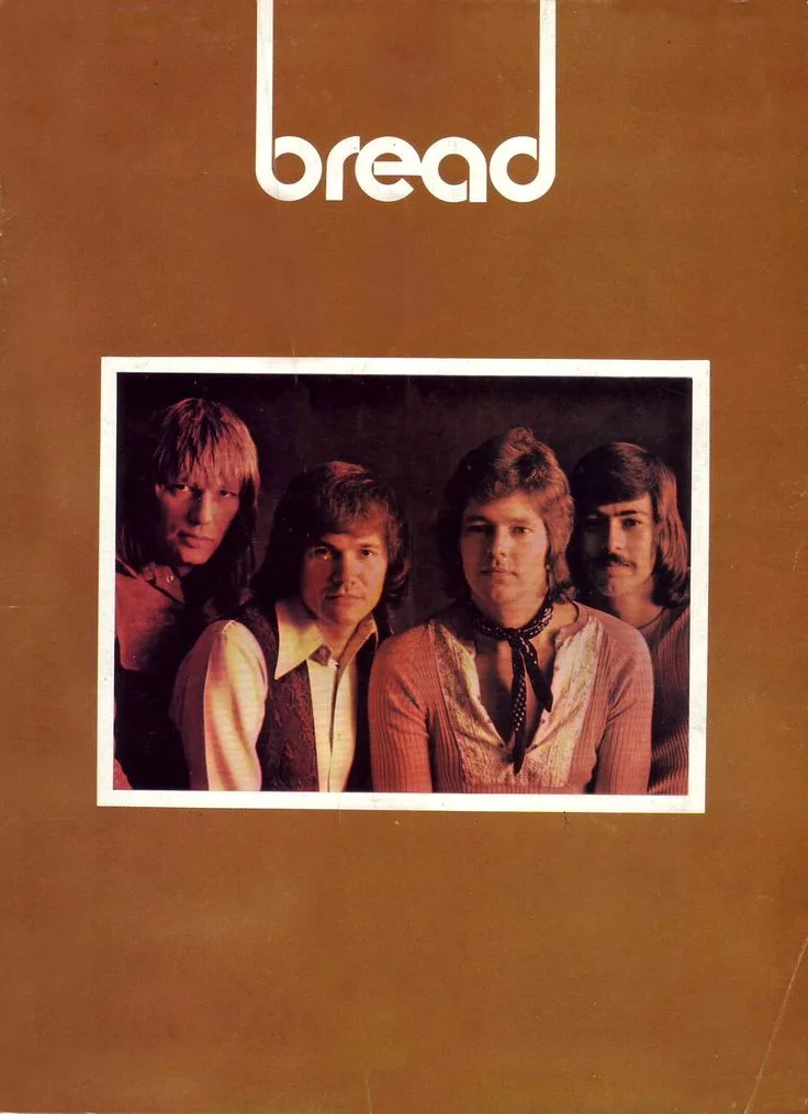 The image shows the album cover for the band 'bread', featuring a photo of four men in 1970s-style clothing against a brown…
