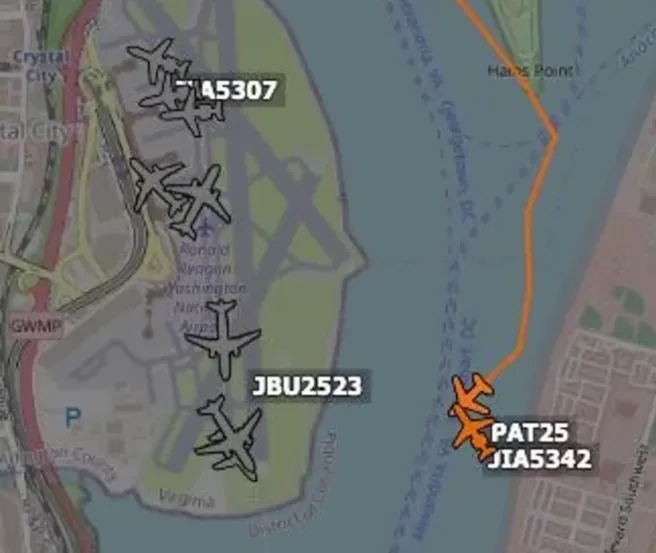 A map view of Ronald Reagan Washington National Airport shows multiple aircraft icons with flight numbers. One group near…