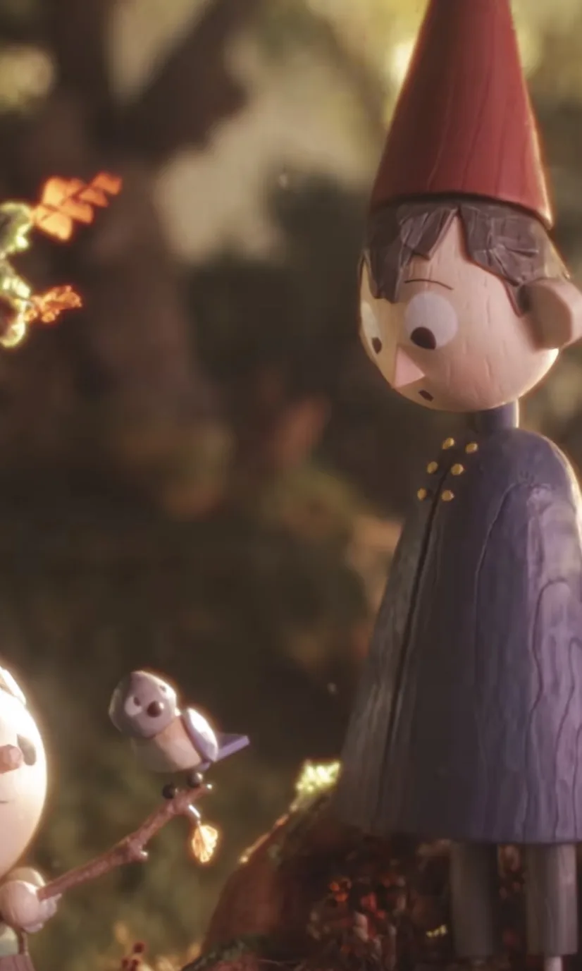 A still from the animated film 'The Mitchells vs. The Machines' shows a young boy with a red pointed hat and a purple coat…