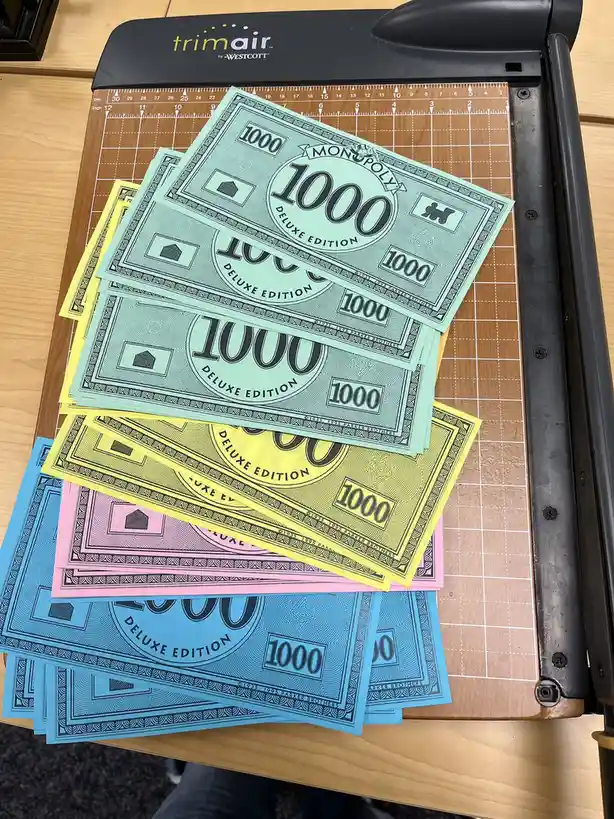 My boss requested a stack of Monopoly money...