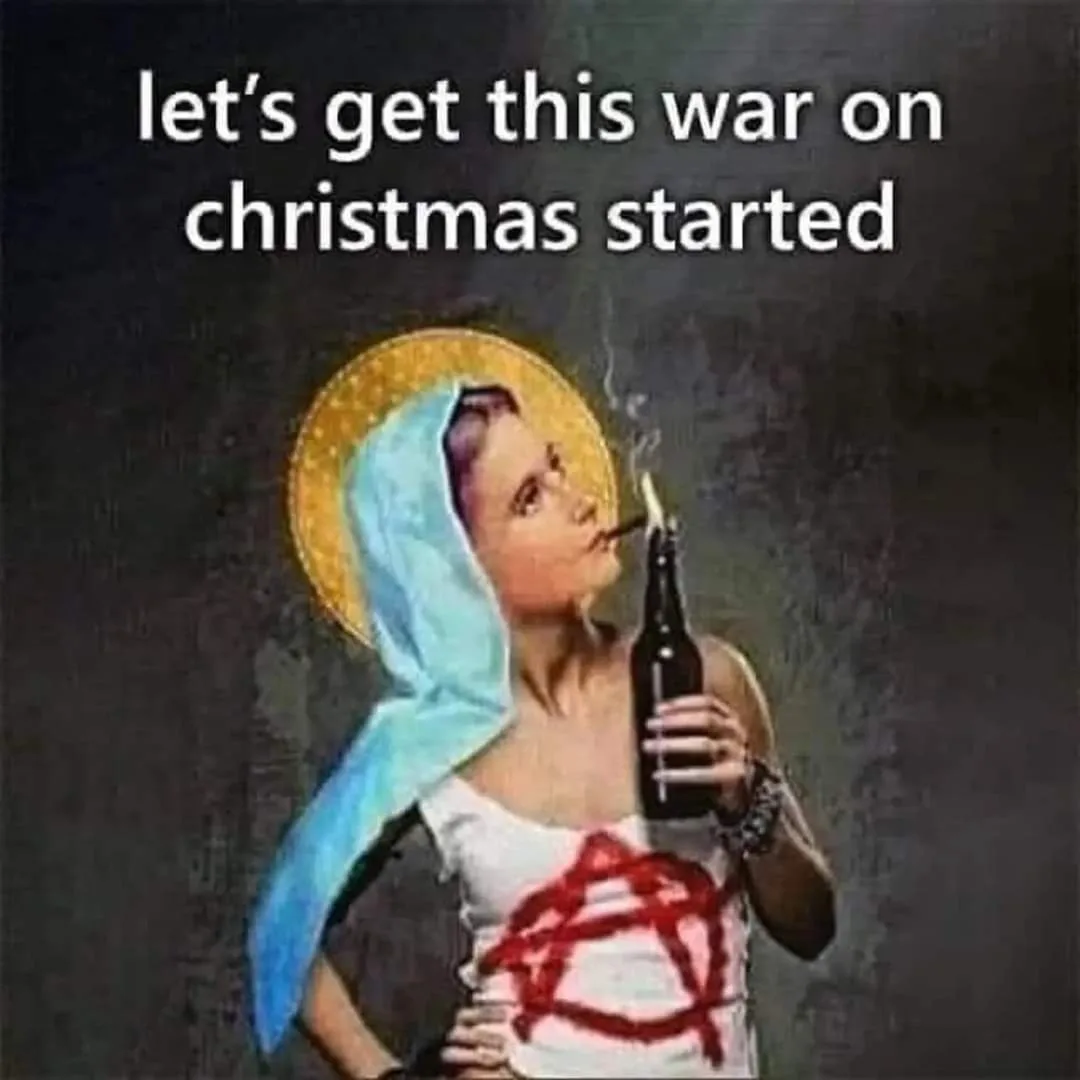 A digitally altered image shows a woman styled as a saint, wearing a blue headscarf and a white top with a red pentagram…