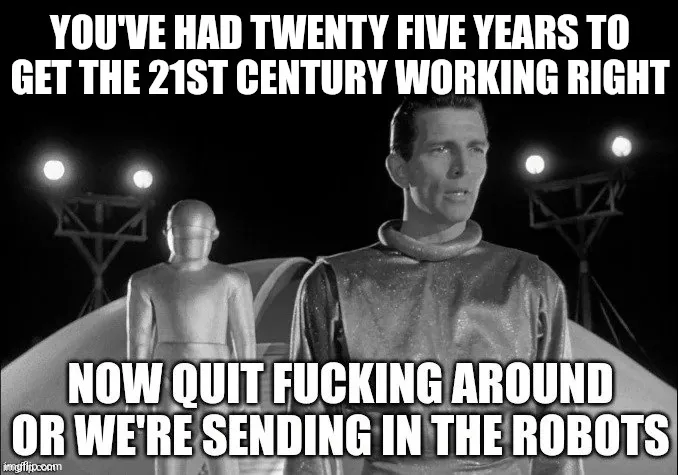 A black-and-white image from the 1951 film 'The Day the Earth Stood Still' shows a man in a metallic suit standing beside a…