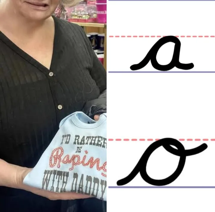 A woman holds a baby onesie with the text 'I'D RATHER BE Aspiring WITH DADDY' printed on it. The word 'Aspiring' is stylized…