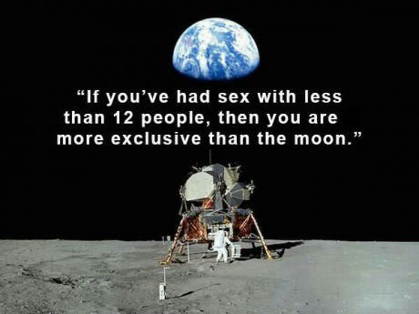 A vintage photograph of the Apollo lunar module on the moon's surface, with Earth visible in the black sky above. A…