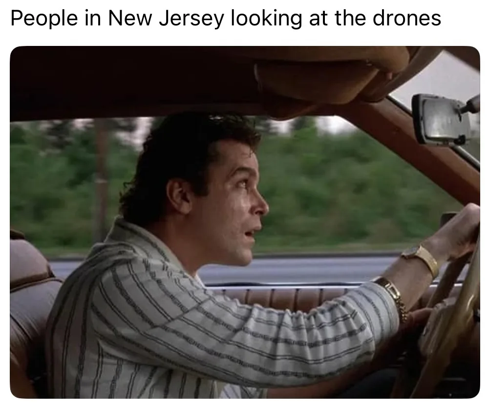 A man is driving a car with a surprised expression, looking out the window. The overlaid text reads 'People in New Jersey…