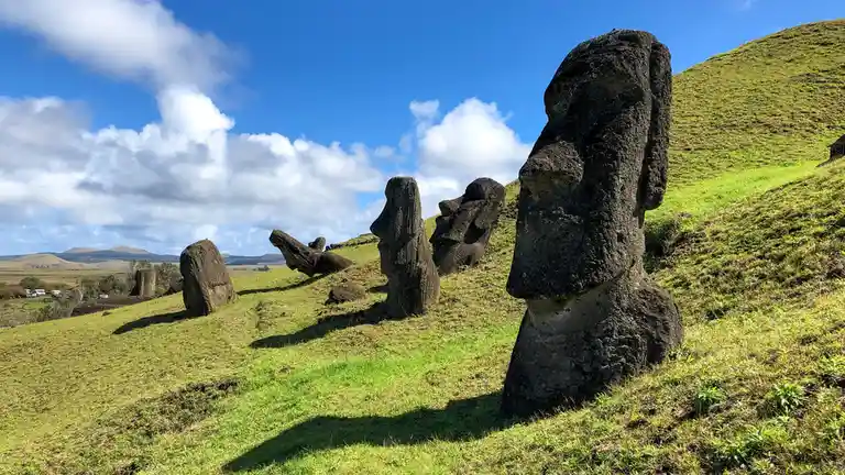 On Easter Island, roam the remote terrain to discover nearly a thousand stern stone faces called moai, symbolizing Rapa Nui…