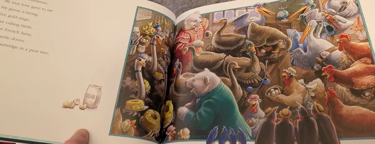 An open children's book page shows an illustration of anthropomorphic animals, including bears and various birds, in a…