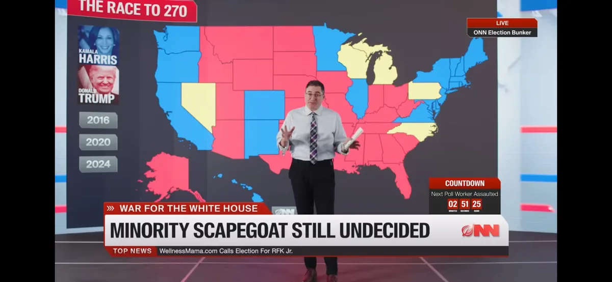 A news anchor stands before a map of the U.S. with states colored red, blue, and yellow, indicating electoral votes for…